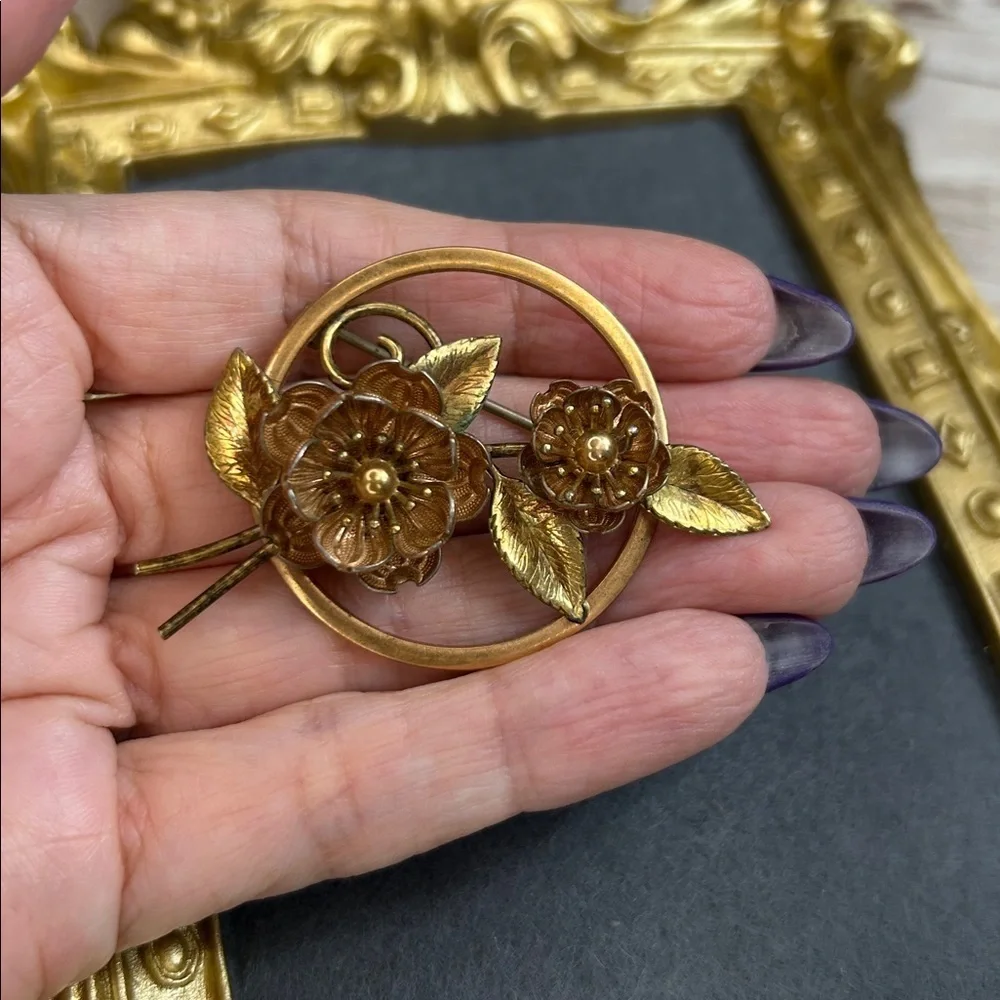 vintage Krementz brooch featuring floral designs in a mixed rose and yellow gold